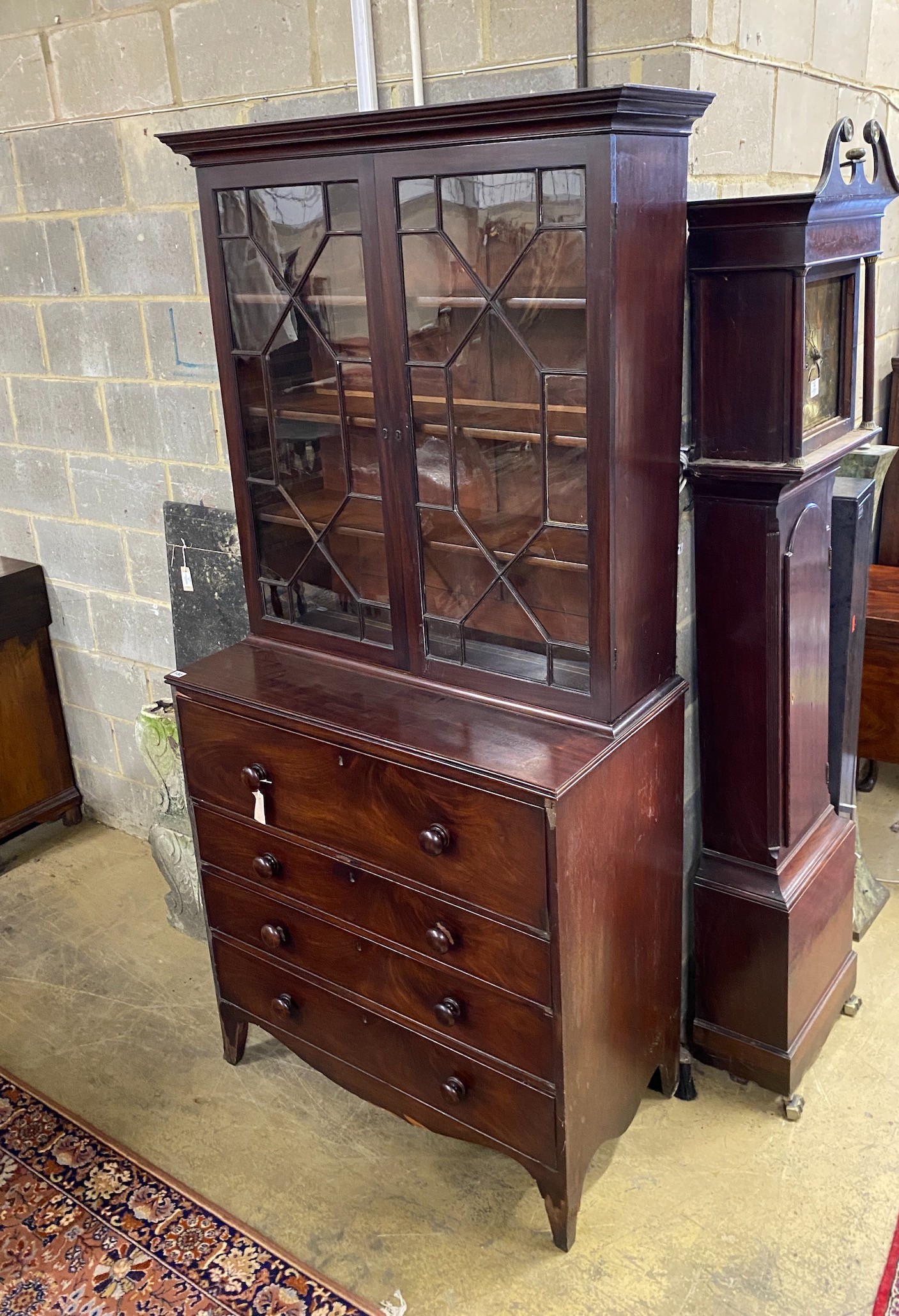 A Regency mahogany secretaire bookcase, width 102cm, depth 54cm, height 219cm